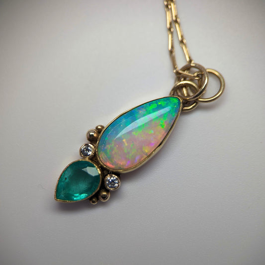 Australian Crystal Opal and Emerald Pendant with accent diamonds in 18 & 9 K  Yellow Gold.