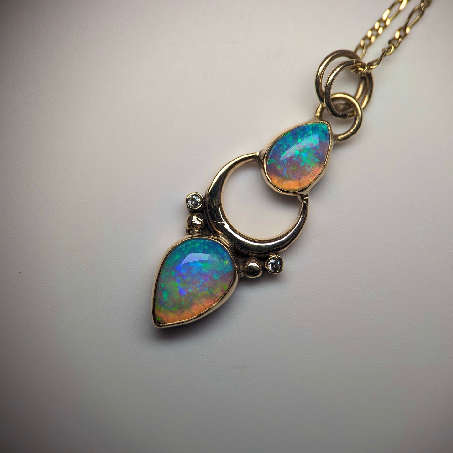 Over The Moon Pendant with Double Crystal Australian Opals and Accent Diamonds in 9 K Yellow Gold