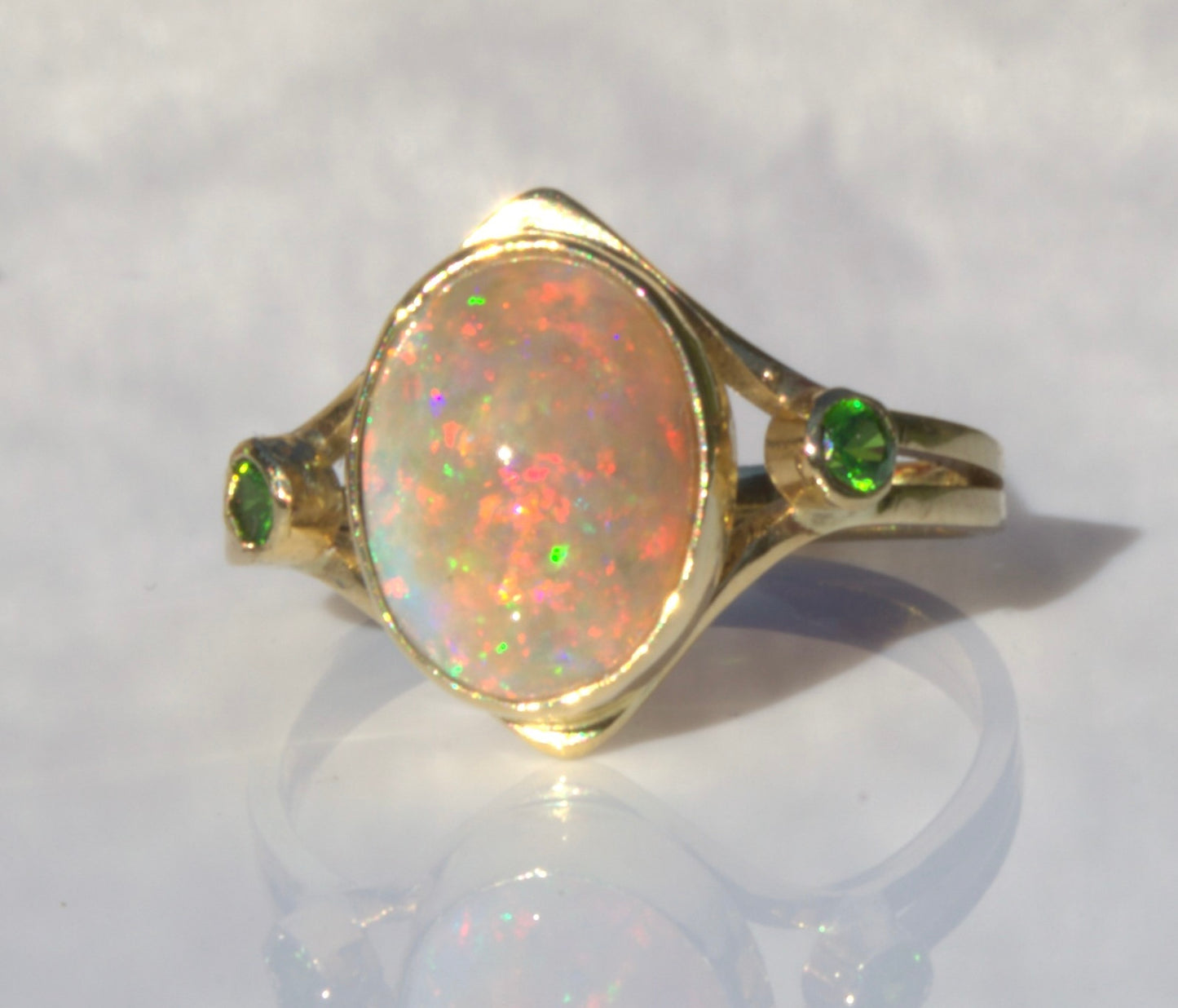 A Rare Eggshell Australian Opal Ring with Accent Demantoid Garnets in 18K Yellow Gold