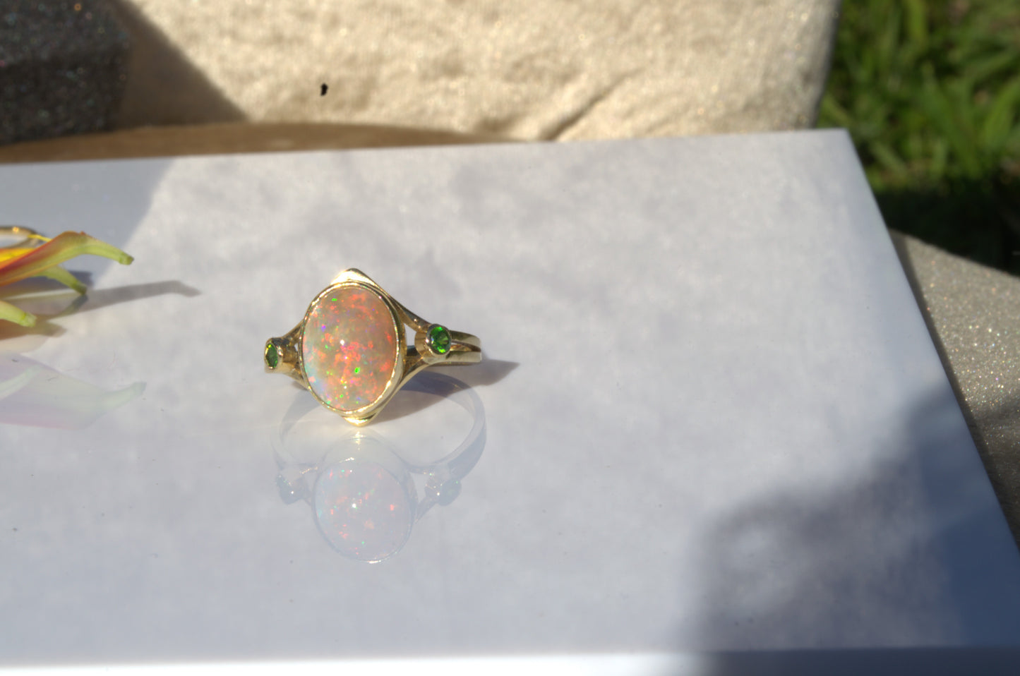 A Rare Eggshell Australian Opal Ring with Accent Demantoid Garnets in 18K Yellow Gold