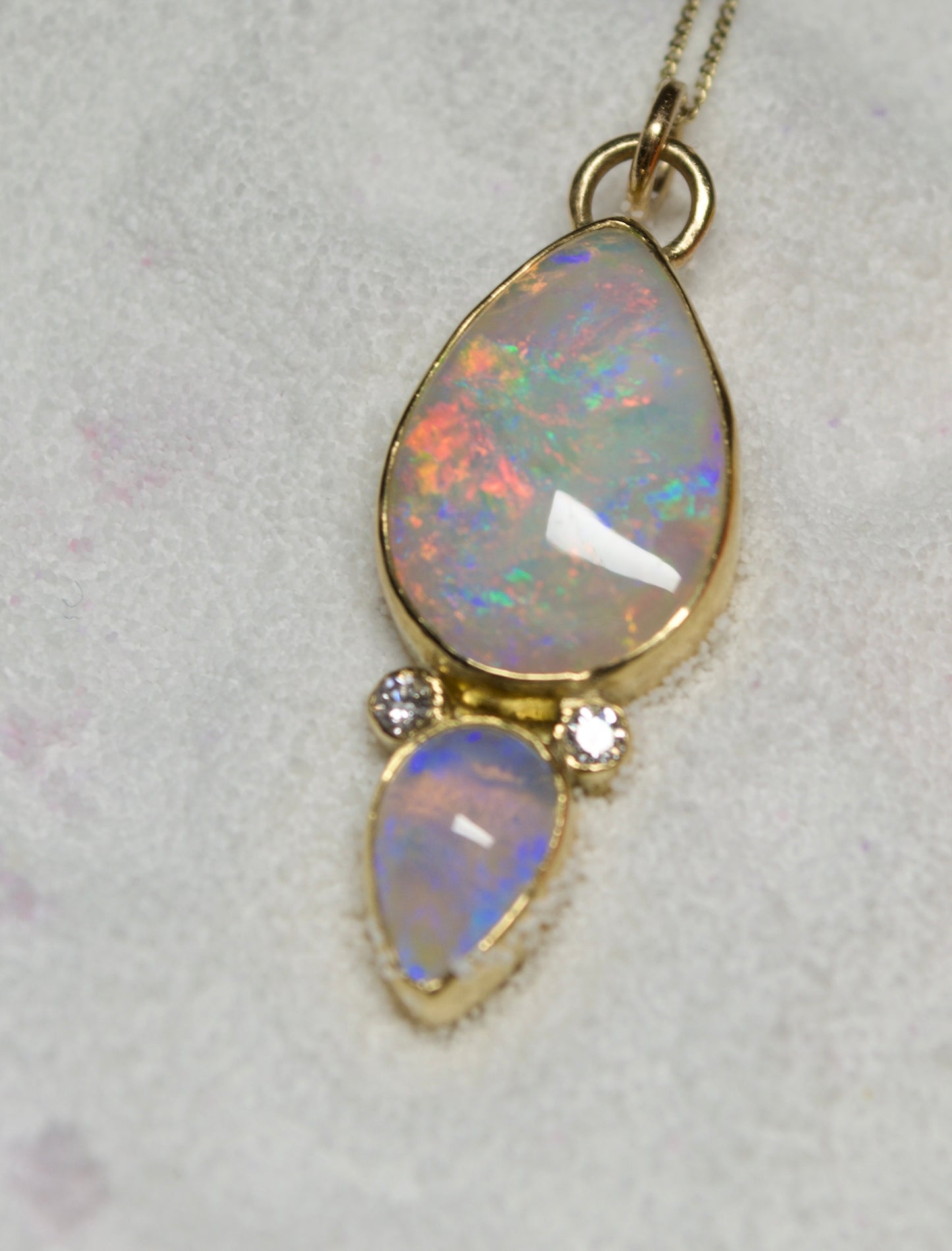 A statement Double Australian Opal Pendant with Accent Diamonds in 18K Yellow Gold . Assay Hallmarked