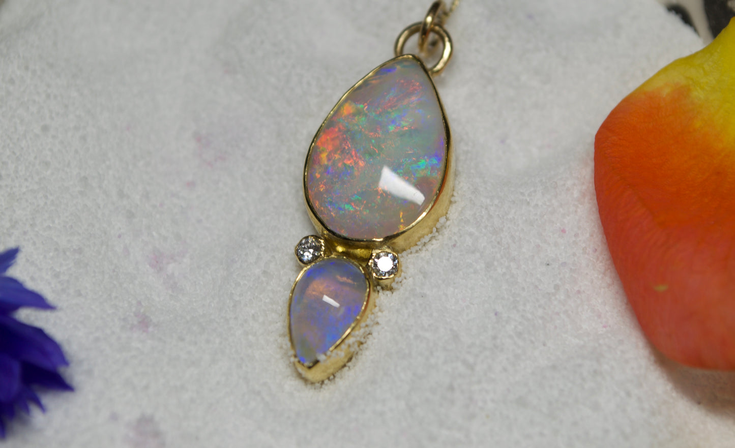 A statement Double Australian Opal Pendant with Accent Diamonds in 18K Yellow Gold . Assay Hallmarked